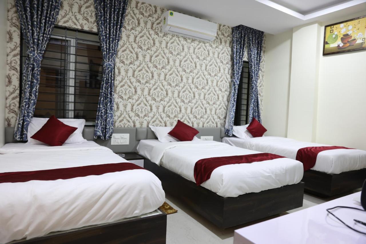 Sunshine International Boarding & Lodging Belur  Экстерьер фото