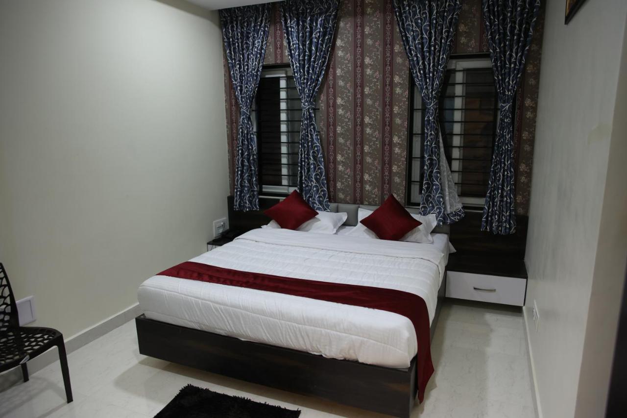 Sunshine International Boarding & Lodging Belur  Экстерьер фото
