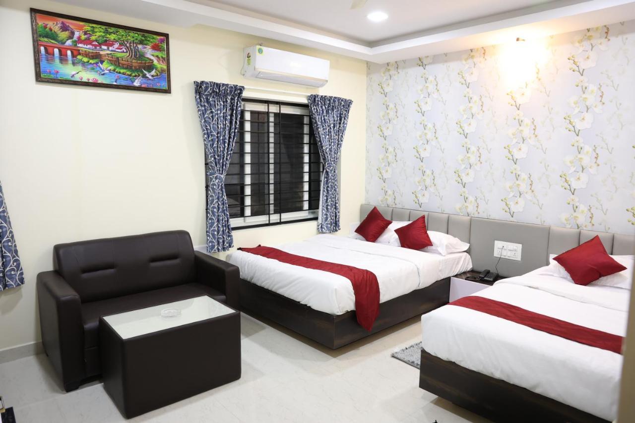 Sunshine International Boarding & Lodging Belur  Экстерьер фото
