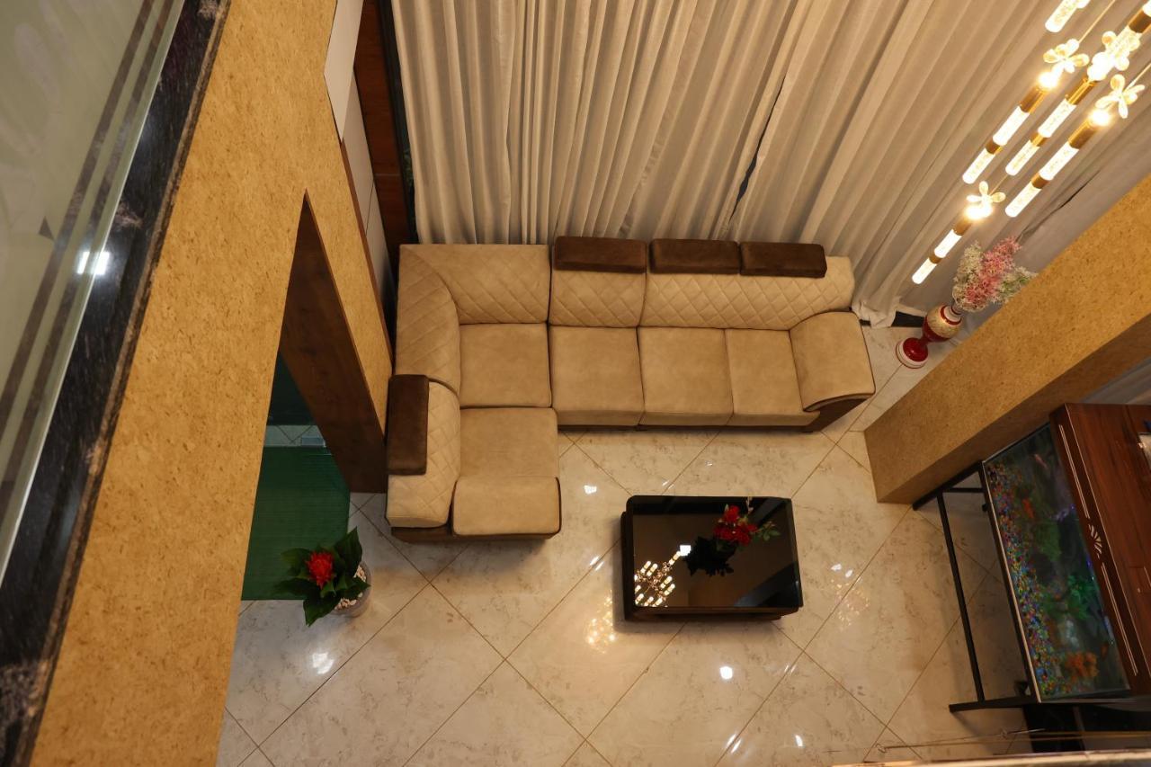 Sunshine International Boarding & Lodging Belur  Экстерьер фото