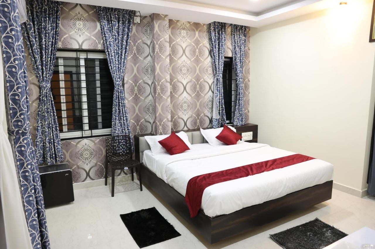 Sunshine International Boarding & Lodging Belur  Экстерьер фото