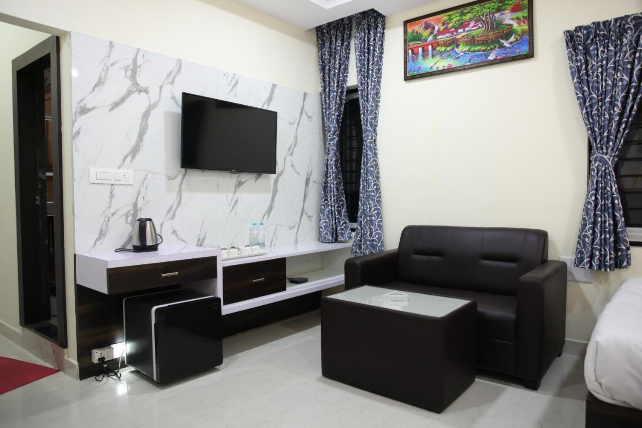 Sunshine International Boarding & Lodging Belur  Экстерьер фото