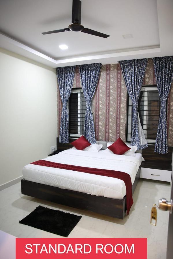 Sunshine International Boarding & Lodging Belur  Экстерьер фото